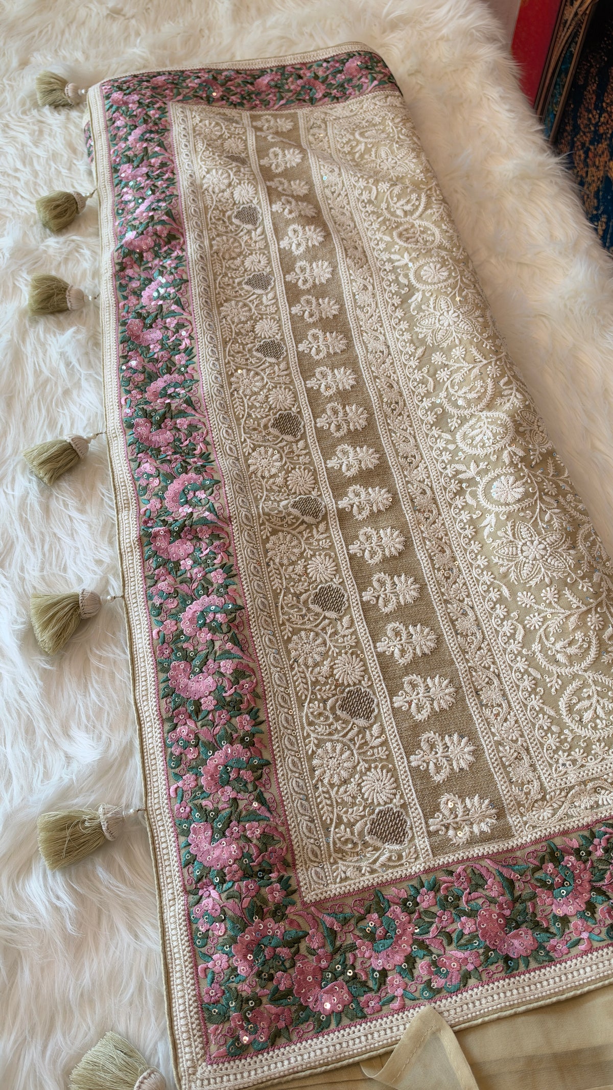 Regal Chikankari Georgette Saree with Ornate Pastel Floral Border & Handcrafted Tassels