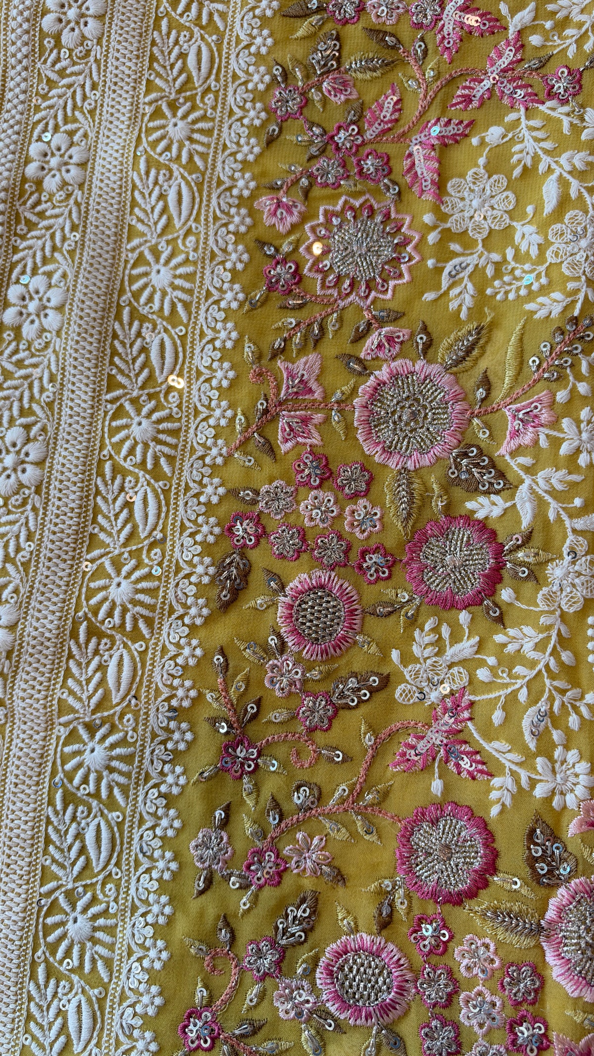 Handcrafted Chikankari Premium Georgette Saree with Multicolored Floral Embroidery & Pallu Tassels