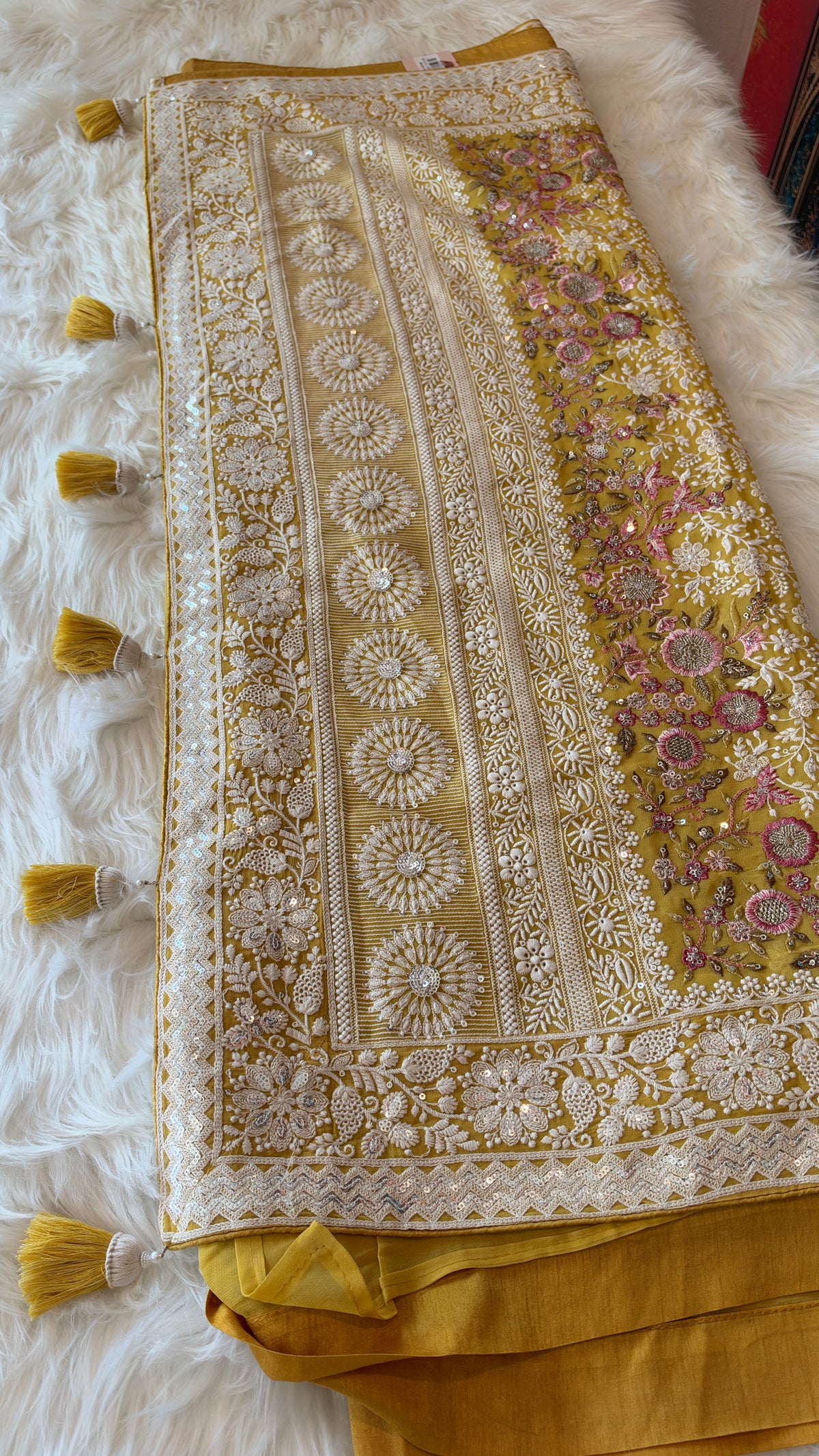 Handcrafted Chikankari Premium Georgette Saree with Multicolored Floral Embroidery & Pallu Tassels
