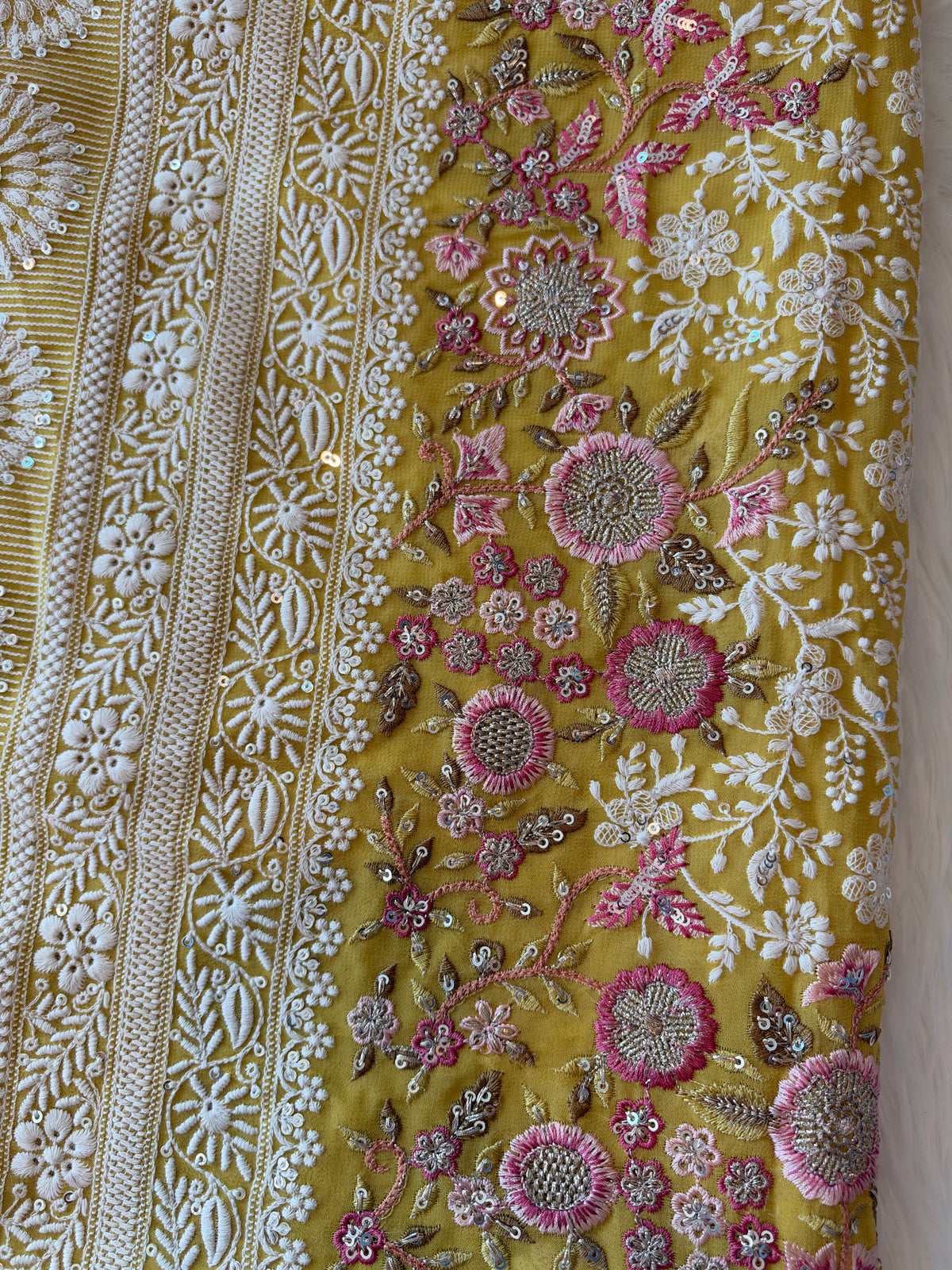 Handcrafted Chikankari Premium Georgette Saree with Multicolored Floral Embroidery & Pallu Tassels