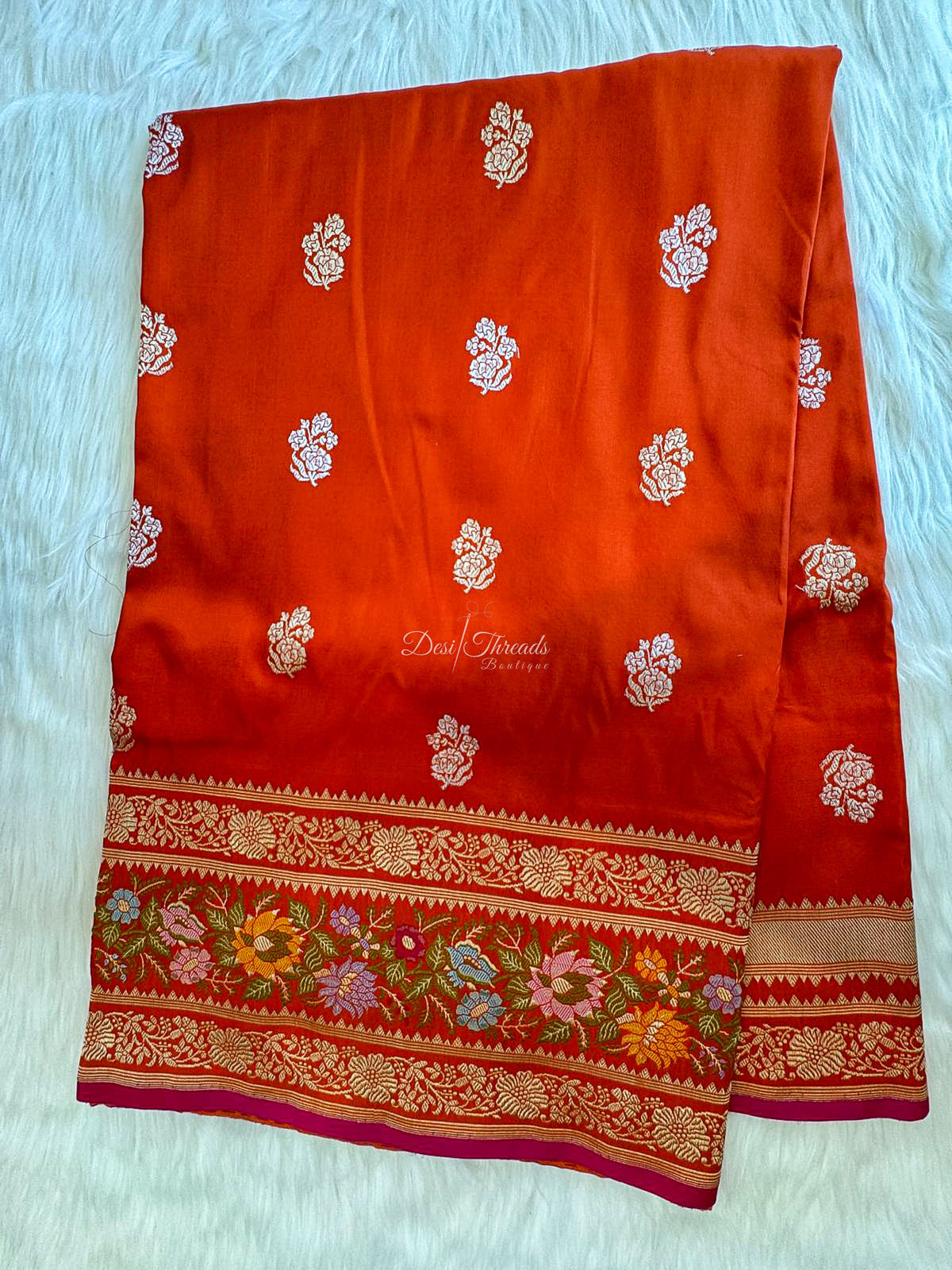 Orange Banarasi Silk Saree with Zari Buttis and Meenakari Floral Border